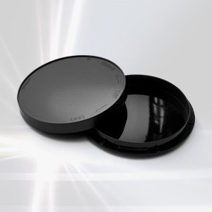 Black light-blocking petri dish with its lid partly open
